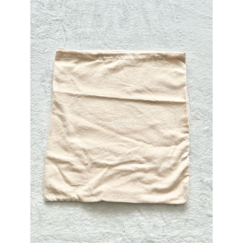 BADGLEY MISCHKA cream colored dust bag